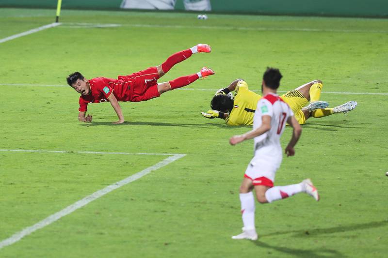 Wu Lei of China is brought down in the penalty area by Syria's Ibrahim Alma. China won the match 3-1, but both sides continue on the road to Qatar 2022. Getty Images