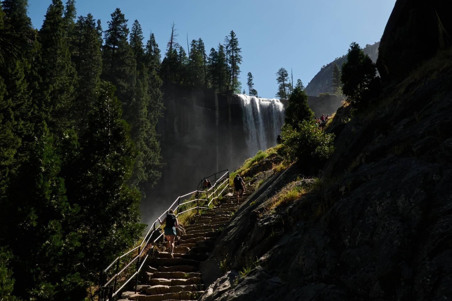 Tourists hike up stairs towards Vernal Falls in Yosemite National Park, California. Bloomberg
