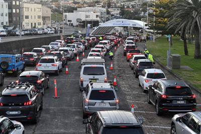 Cars queue at a drive-through Covid-19 testing centre at Bondi Beach in Sydney, Australia. Sydney and surrounding areas have gone into lockdown for two weeks following a surge of Delta variant cases. EPA