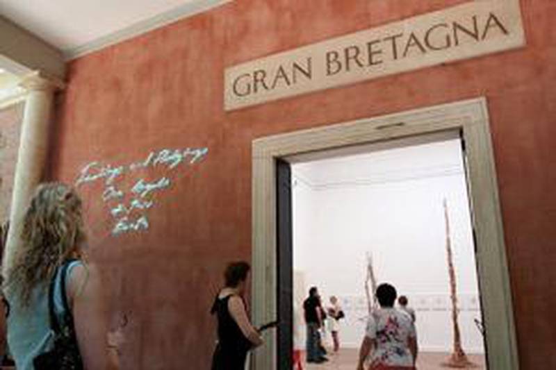 Visitors look at the installation by the British artist Tracey Emin exhibited at the British pavillion during the 2007 Venice Biennale.
