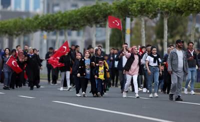 AKP supporters walk to the Presidential Palace in Ankara to attend his victory speech. Reuters