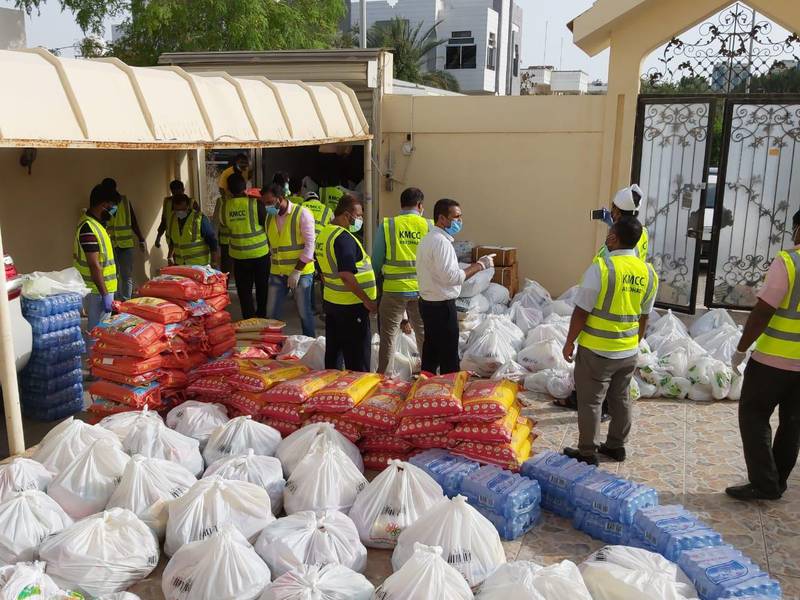 Volunteers from the Kerala Muslim Cultural Centre in Abu Dhabi get ready to distribute food to people in Abu Dhabi. Courtesy Kerala Muslim Cultural Centre