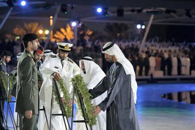 ABU DHABI, UNITED ARAB EMIRATES - November 30, 2019: HH Sheikh Mohamed bin Zayed Al Nahyan, Crown Prince of Abu Dhabi and Deputy Supreme Commander of the UAE Armed Forces (R) and HH Dr Sheikh Sultan bin Mohamed Al Qasimi, UAE Supreme Council Member and Ruler of Sharjah (2nd R) lay wreaths a memorial dedicated to the memory of UAE’s National Heroes in honour of their sacrifice and in recognition of their heroism, during a Commemoration Day ceremony, at Wahat Al Karama, 

( Hamad Al Kaabi / Ministry of Presidential Affairs )​
---