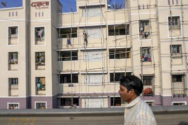 A low-cost building at a Maharashtra Housing and Area Development Authority (MHADA) in Kurla, Mumbai. The government has pledged to build 12 million new houses for the urban poor by 2022. Bloomberg