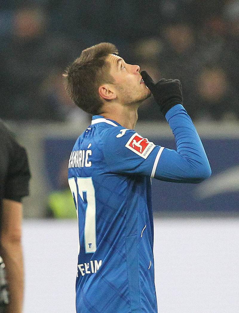 Hoffenheim's Croatian forward Andrej Kramaric celebrate scoring during the German First division Bundesliga football match TSG 1899 Hoffenheim v Mainz 05 in Sinsheim, southern Germany, on November 24, 2019. (Photo by Daniel ROLAND / AFP) / DFL REGULATIONS PROHIBIT ANY USE OF PHOTOGRAPHS AS IMAGE SEQUENCES AND/OR QUASI-VIDEO
