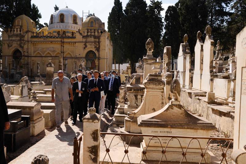 President Macron during the visit to the European Saint-Eugene cemetery in Algiers. AFP