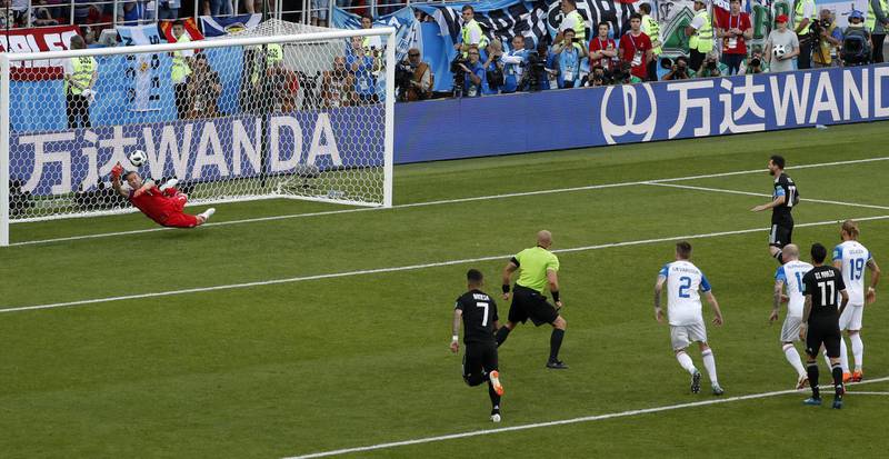 Iceland goalkeeper Hannes Halldorsson saves a penalty by Argentina's Lionel Messi. Rebecca Blackwell / AP Photo