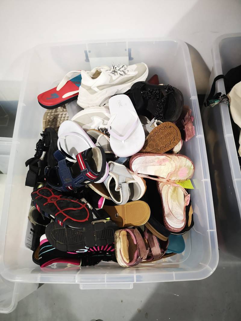 A box containing shoes lost by their owners in Dubai.