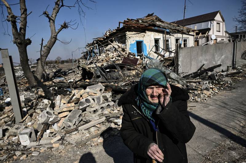 A resident of the village of Krasylivka after Russian bombardment, part of Moscow's effort to move on Kyiv. AFP