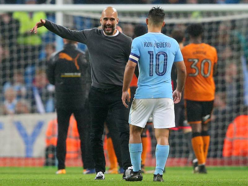 MANCHESTER, ENGLAND - OCTOBER 24:  Josep Guardiola, Manager of Manchester City and Sergio Aguero of Manchester City celebrate after winning the penalty shoot out in the Carabao Cup Fourth Round match between Manchester City and Wolverhampton Wanderers at Etihad Stadium on October 24, 2017 in Manchester, England.  (Photo by Alex Livesey/Getty Images)
