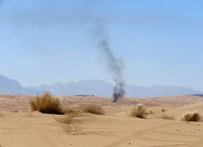 Smoke from fighting in Yemen's deserts. AFP