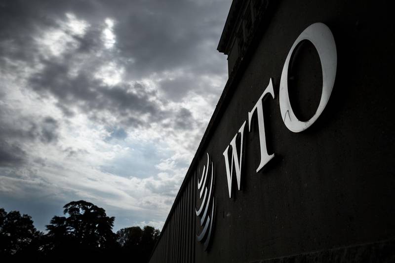 (FILES) In this file photo taken on September 21, 2018, a sign of the World Trade Organization (WTO) is seen at their headquarters in Geneva. The World Trade Organization on Thursday, April 18, 2019 largely sided with the United States in its Obama-era case against Beijing over Chinese restrictions on imports of American grain. The WTO decision was the second in as many months to favor Washington's position on trade with China in grain.  - 
 / AFP / Fabrice COFFRINI
