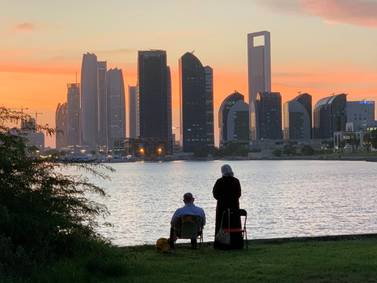 A sunset in Abu Dhabi. The UAE's clear rules have gone a long way to help the country deal with Covid-19. Victor Besa / The National