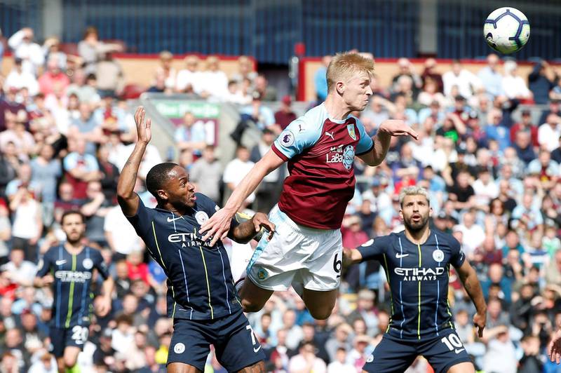 Manchester City's Raheem Sterling in action with Burnley's Ben Mee. Reuters