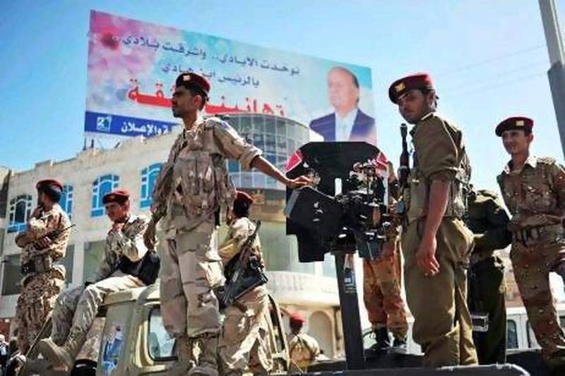 One analyst says Yemeni soldiers and militias need to be removed from city streets before any political reforms can take place.