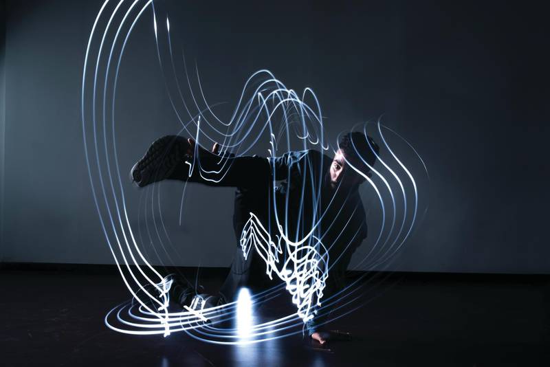 The movement of break dancers is traced by light streams in Ali Haji’s ‘Lightbreakers’ Ali Haji