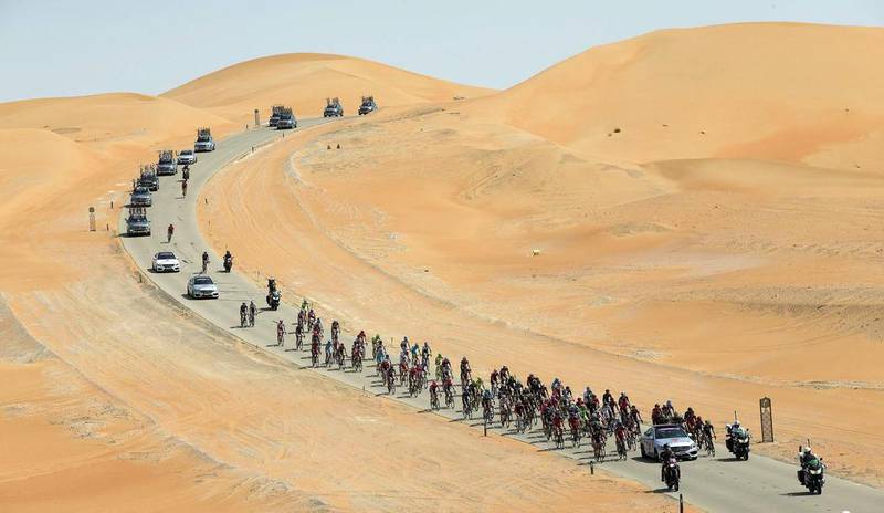 The peloton ride through the desert on Thursday on the first day of the Abu Dhabi Tour. Claudio Peri / EPA
