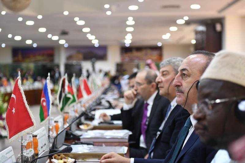 Turkish Foreign Minister Mevlut Cavusoglu (second right) attends an emergency ministerial meeting of the Organisation of Islamic Cooperation (OIC) in Jeddah. AFP