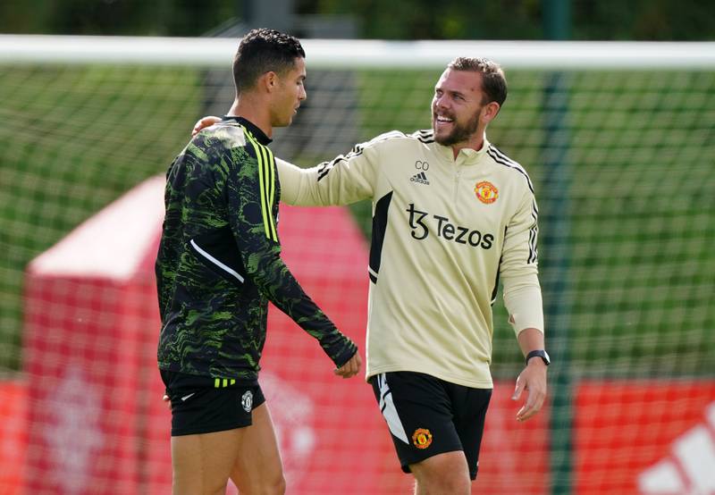 Manchester United's Cristiano Ronaldo and Fitness Coach Charlie Owen. PA