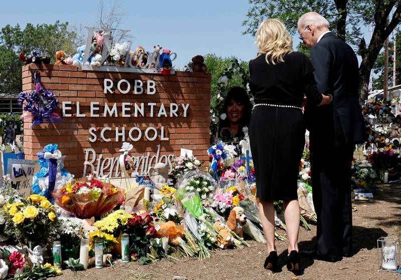 President Joe Biden and his wife Jill Biden paid their respects at the Robb Elementary School memorial. A gunman killed 19 children and two teachers in the deadliest US school shooting in almost a decade, in Uvalde, Texas, in May. Reuters