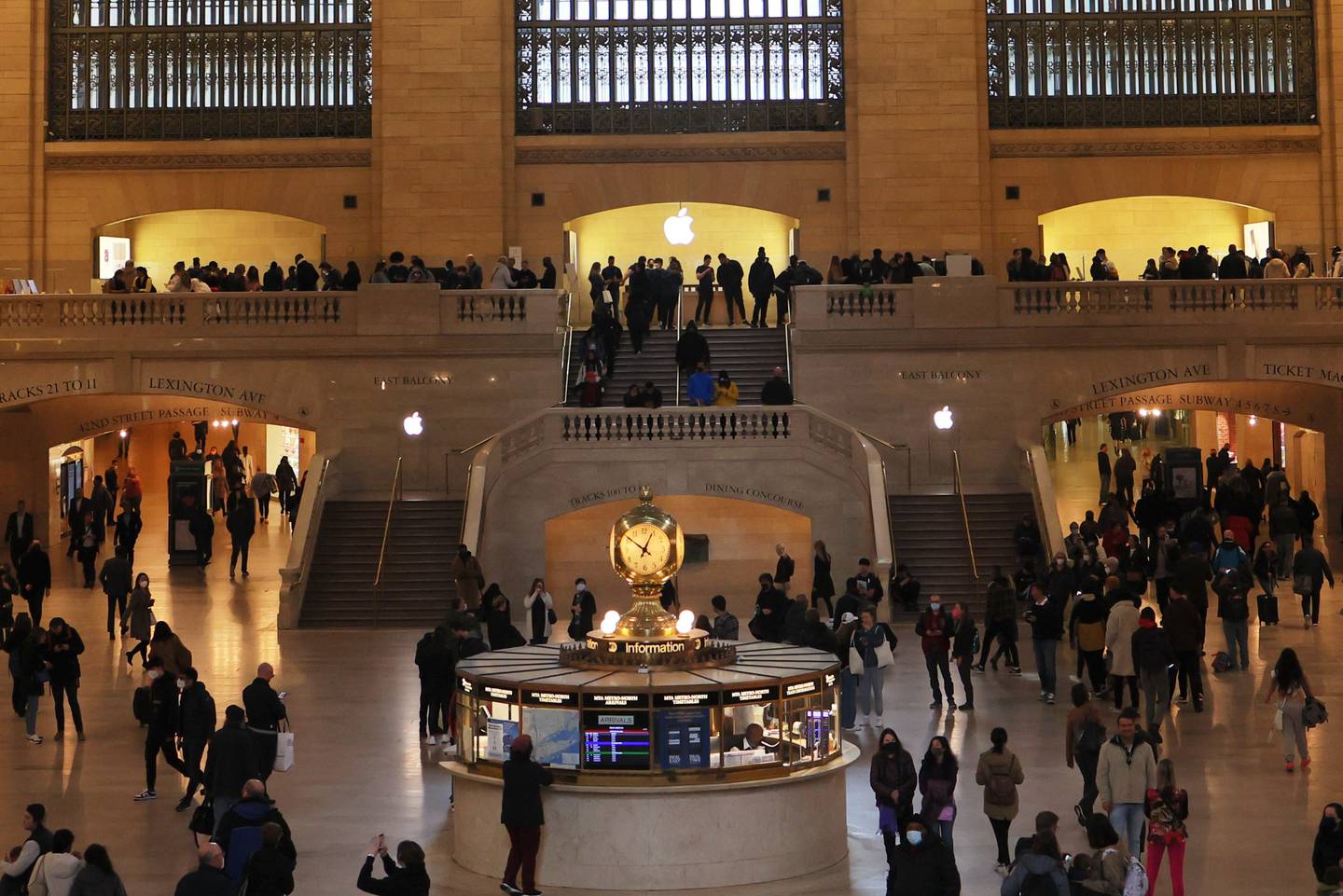 People visit the Apple store in Grand Central station on April 18 in New York. AFP
