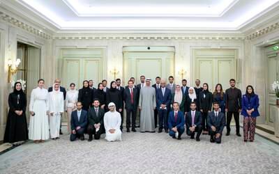 President Sheikh Mohamed and Sheikh Hazza bin Zayed, vice chairman of the Abu Dhabi Executive Council, with Emirati students and doctors studying in France. 