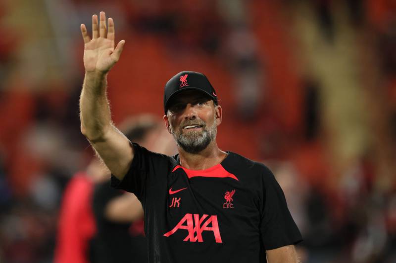Liverpool manager Jurgen Klopp waves to fans at Rajamangala National Stadium. AFP