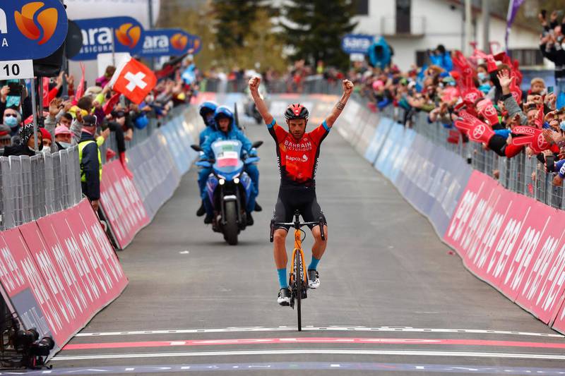 Italy's Damiano Caruso celebrates as he crosses the finish line to win Stage 20. AFP