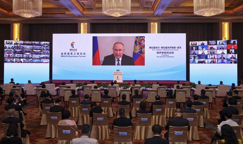 Russian President Vladimir Putin delivers a keynote speech at the opening ceremony of the BRICS Business Forum in Beijing on June 22, 2022.  AP