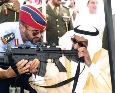 Sheikh Zayed and Sheikh Mohamed visit the Idex defence exhibition in Abu Dhabi in 2003. Sheikh Zayed died the following year. Photo: National Archives
