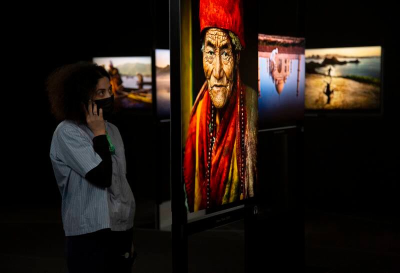 More than 150 large-format photographs by renowned American photographer Steve McCurry are being exhibited at Musee Maillol in Paris.