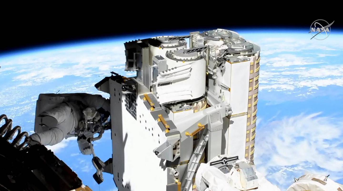 This NASA TV frame grab image captured on June 16, 2021 shows US astronaut Shane Kimbrough(L), checking the solar arrays during the ISS Expedition 65 US Spacewalk # 74 to install the First IROSA Solar Array on the P6 Truss for the 2B Channel Power System. The spacewalk will last over six hours in support of station assembly, maintenance, and upgrades. - RESTRICTED TO EDITORIAL USE - MANDATORY CREDIT "AFP PHOTO /NASA TV/HANDOUT " - NO MARKETING - NO ADVERTISING CAMPAIGNS - DISTRIBUTED AS A SERVICE TO CLIENTS
 / AFP / NASA TV / Handout / RESTRICTED TO EDITORIAL USE - MANDATORY CREDIT "AFP PHOTO /NASA TV/HANDOUT " - NO MARKETING - NO ADVERTISING CAMPAIGNS - DISTRIBUTED AS A SERVICE TO CLIENTS
