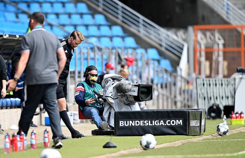 A TV camera man is seen during the German Bundesliga Second Division soccer match between VfL Bochum 1848 and 1. FC Heidenheim 1846 at Vonovia Ruhrstadion in Bochum, Germany.  EPA