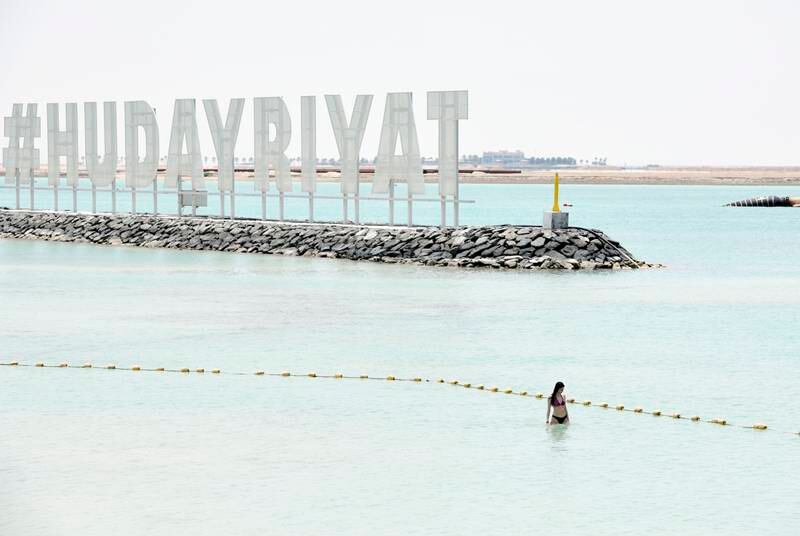 A bather at Al Hudayriyat Island, Abu Dhabi. Photo: Khushnum Bhandari / The National
