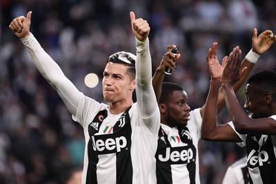 Cristiano Ronaldo acknowledges fans as Juventus celebrate winning the Serie A title. AFP