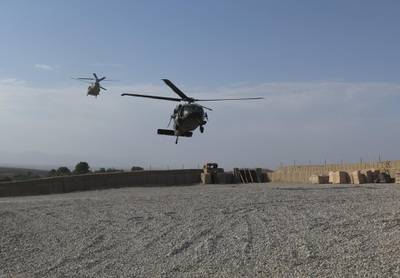NATO helicopters land at Afghan and U.S. Special Forces base in Deh Bala district, Nangarhar province, Afghanistan July 7, 2018. Picture taken July 7, 2018.REUTERS/James Mackenzie