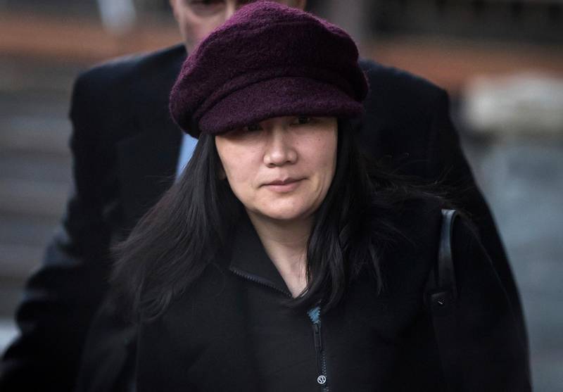 FILE- In this Jan. 29, 2019, file photo, Huawei chief financial officer Meng Wanzhou leaves her home to attend a court appearance in Vancouver, British Columbia. Canada said Friday, March 1, 2019, it will allow the U.S. extradition case against Wanzhou to proceed. She is due in court on March 6, at which time a date for her extradition hearing will be set. Meng is wanted in the U.S. on fraud charges that she misled banks about the company's business dealings in Iran.   (Darryl Dyck/The Canadian Press via AP, File)