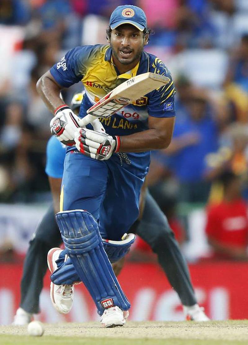 Sri Lanka's Kumar Sangakkara plays a shot during their fifth ODI cricket match against England in Pallekele December 10, 2014. Dinuka Liyanawatte / Reuters
