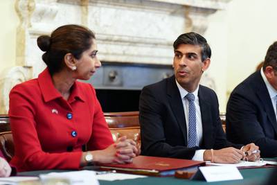 Britain's Prime Minister Rishi Sunak and Ms Braverman at a policing roundtable summit at 10 Downing Street in October. AFP