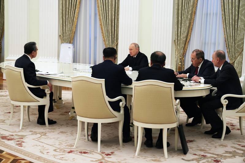 Senior Russian and Chinese officials meet at the Kremlin. AP 