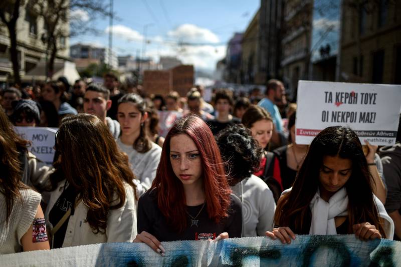 A minute's silence in tribute to the 57 victims of the Greek rail tragedy last week, in Athens.  AFP