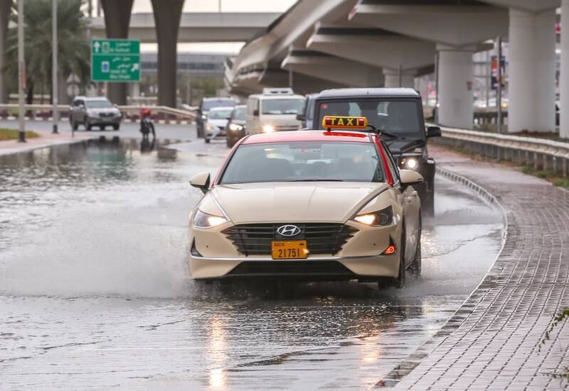 The rain caused waterlogging on some roads. Victor Besa / The National