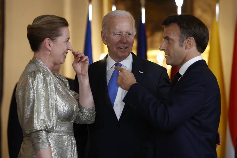 Denmark's Prime Minister Mette Frederiksen, left, with Mr Biden and Mr Macron. EPA