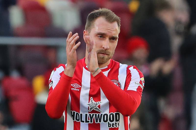 Brentford's Danish midfielder Christian Eriksen applauds the fans after the English Premier League football match between Brentford and Newcastle United at Brentford Community Stadium in London on February 26, 2022.  (Photo by Geoff Caddick / AFP) / RESTRICTED TO EDITORIAL USE.  No use with unauthorized audio, video, data, fixture lists, club/league logos or 'live' services.  Online in-match use limited to 120 images.  An additional 40 images may be used in extra time.  No video emulation.  Social media in-match use limited to 120 images.  An additional 40 images may be used in extra time.  No use in betting publications, games or single club/league/player publications.   /  