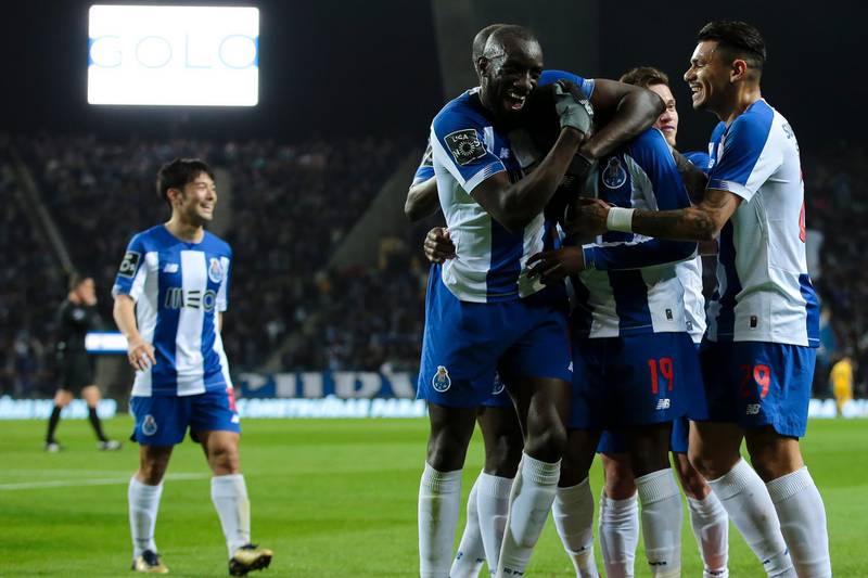 20. Porto 3168 points. Porto players celebrate a goal. EPA