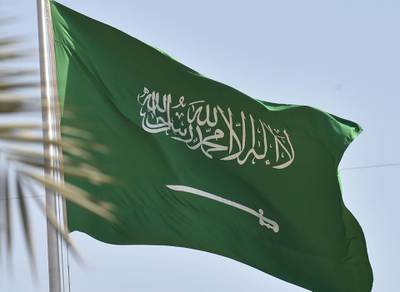 A picture taken on September 22, 2020 shows a Saudi national flag in the capital Riyadh. From scrubbing hate-filled school textbooks to a taboo-defying religious sermon, Saudi Arabia is pushing for another kind of normalisation after declining to establish formal relations with Israel -- co-existence with Jews. / AFP / FAYEZ NURELDINE
