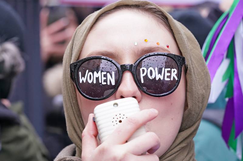 People take part in a Million Women Rise march outside Charing Cross Police Station in central London, before International Women's Day, to protest over violence against women, racism and misogyny. PA
