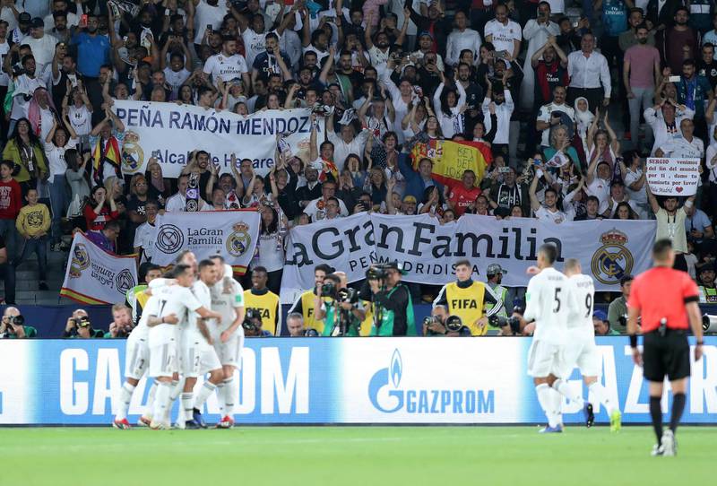 Abu Dhabi, United Arab Emirates - December 22, 2018: Fans celebrate Sergio Ramos of Real Madrids goal during the match between Real Madrid and Al Ain at the Fifa Club World Cup final. Saturday the 22nd of December 2018 at the Zayed Sports City Stadium, Abu Dhabi. Chris Whiteoak / The National