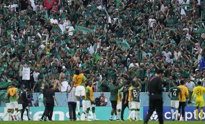 Saudi fans celebrate after their national team beat Argentina 2-1 in the World Cup at the Lusail Stadium in Qatar. AP Photo