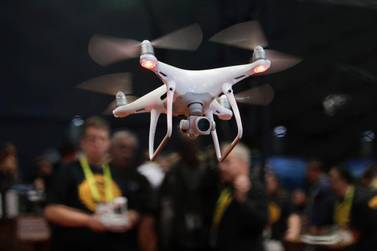 A drone at CES International in Las Vegas. On Wednesday, federal transportation officials announced 10 sites for a three-year drone programme aimed at increasing government and commercial use of unmanned aircraft. Jae C. Hong / AP